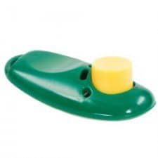 Dog training clicker Green dog training clicker with a yellow button